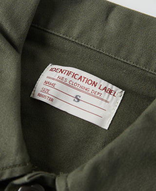 Olive fatigue utility shirt neck label with size and Identification label details