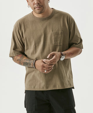 Khaki cotton pocket T-shirt on model with short sleeves and crew neck