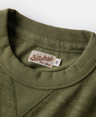 Green cotton T-shirt crew neck with internal brand tag inside collar