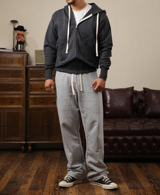 Black terry cloth full-zip hoodie with hood, front zip, and drawstring hem