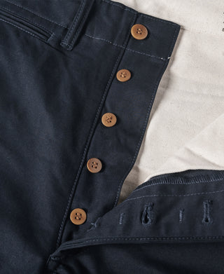 Navy trousers with four-button placket and contrast topstitching