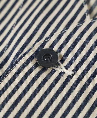 Pinstripe vest button detail with dark round buttons