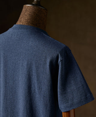 Denim blue cotton T-shirt back shoulder and short sleeve close-up