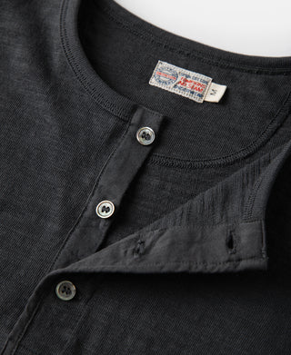 Loopwheel tubular henley T-shirt in black with button placket and ribbed neckline