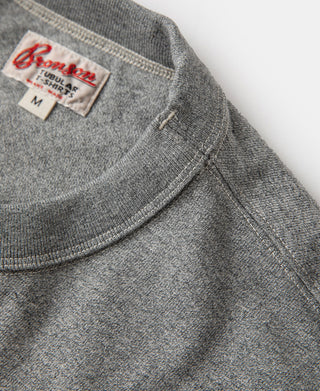 Gray heather crew-neck with inner neck label and stitched collar seam