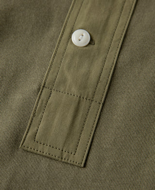 Olive henley t-shirt button placket detail with two white buttons and stitched placket pocket