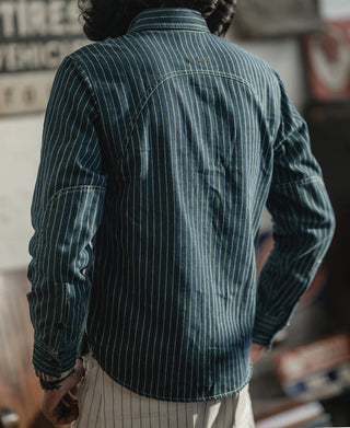 Indigo Wabash work shirt back view with yoke buttons and vented hem seam.