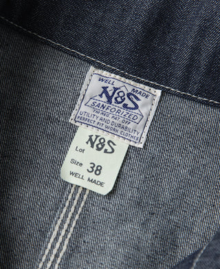 Indigo denim jacket inner neck label with N&S branding and size 38