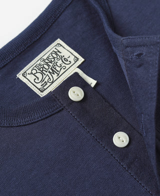 Navy henley t-shirt with chest placket buttons and Bronson Mfg Co. label