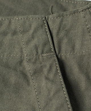 Olive utility shorts close-up of side seam stitching and fabric reinforcement