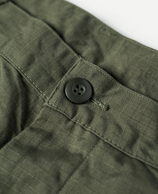 Olive fatigue pants button front with waistband placket and stitched detailing