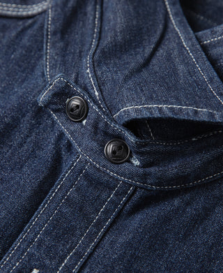 Dark blue denim workshirt with black button placket and contrast stitching