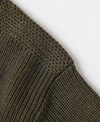 Olive knit sweater with ribbed panel and textured stitch detail