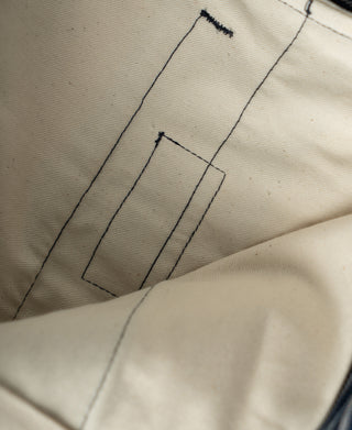 Cream striped work pants, stitched front pocket and fly seam detail