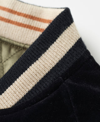Black ribbed knit cuff with cream and dark stripe trim