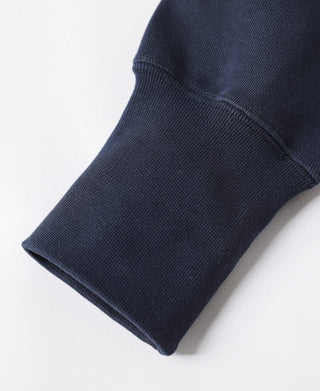 Navy ribbed knit sleeve cuff with elastic hem