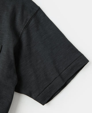 Black slub cotton T-shirt sleeve with clean hem stitching