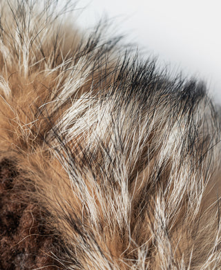 Fur-trim detail on olive Type N-3 parka hood in light tan and gray tones
