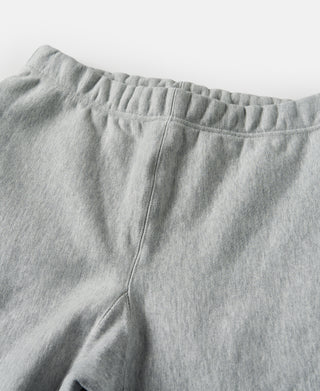 Light gray sweatpants with elastic waistband and center front panel seam