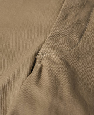 Khaki side pocket with curved opening and diagonal seam