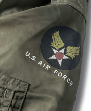 Olive flight jacket with U.S. Air Force wing logo patch on chest