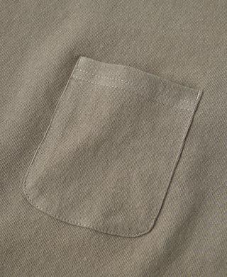 Khaki front pocket on cotton T-shirt with visible topstitching