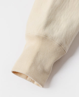 Apricot hoodie ribbed cuff detail on sleeve.