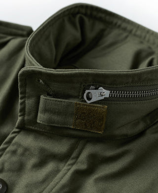 Olive M-65 field jacket hooded collar with front zipper tab