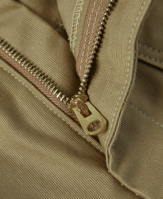 Khaki deck pants close-up of metal zipper and fly seam