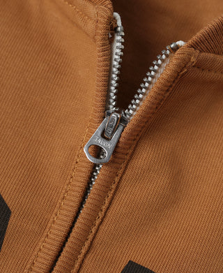 Quarter-zip neckline with silver zipper hardware on orange long-sleeve T-shirt