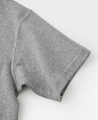 Gray crewneck T-shirt sleeve and side seam close-up