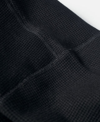 Black waffle-knit neckline seam with ribbed knit detail