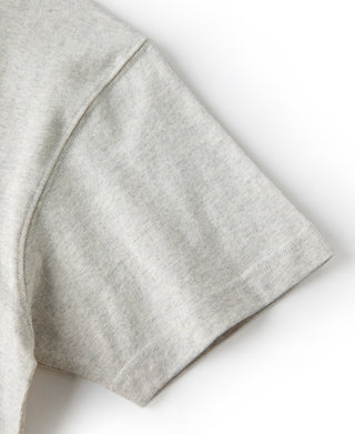 Oatmeal crewneck cotton T-shirt sleeve detail with folded side seam.