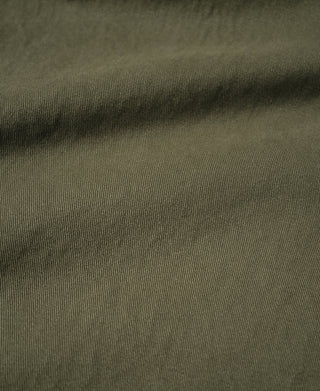 Olive Bermuda pants fabric panel with visible woven texture