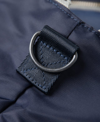 Navy helmet bag strap with rounded metal D-ring attachment