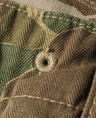 Camouflage herringbone cotton fabric with round button detail