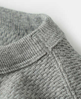 Gray thermal shirt sleeve with ribbed cuff and textured waffle knit body