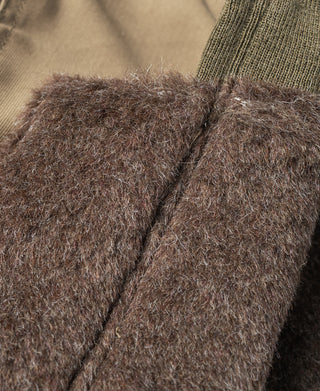 Deck jacket lining close-up with dark brown fuzzy insulation