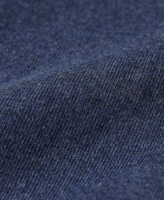 Denim blue cotton T-shirt fabric texture close-up