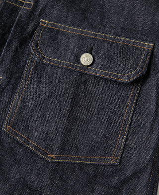 Indigo denim chest pocket with flap and metal button, contrast yellow stitching