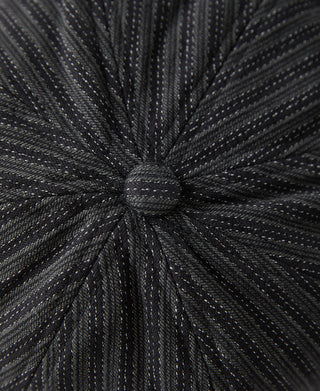 Black and gray yarn-dyed newsboy cap crown with gathered top button.