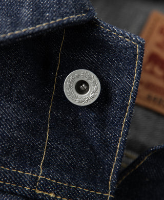 WWII Type 1 selvedge denim jacket, dark indigo, close-up of round metal button