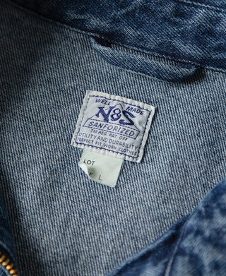 Stonewashed indigo denim work jacket interior care label, size L