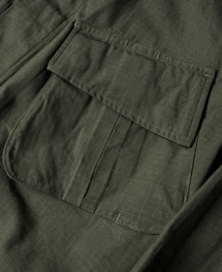 Olive jacket chest pocket with flap and stitched seam details