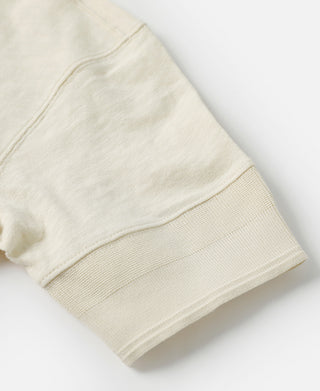 Cream white slub cotton henley T-shirt sleeve hem with ribbed cuff