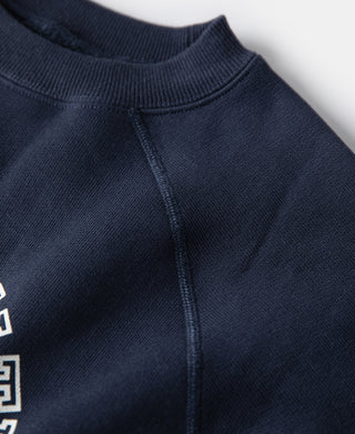Navy raglan sweatshirt with crew neck and contrast-stitched seam detail