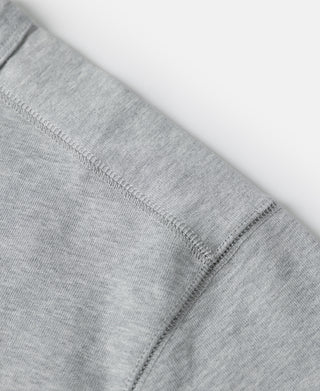 Gray cotton short-sleeve T-shirt hem with neat double-stitch seam