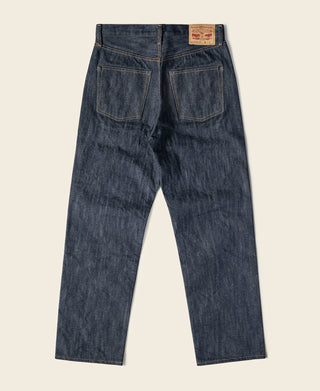 Blue denim jeans front view with two front pockets, belt loops, and brand patch