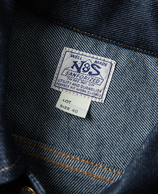 Indigo denim jacket interior label: made well, sanforized, size 40.