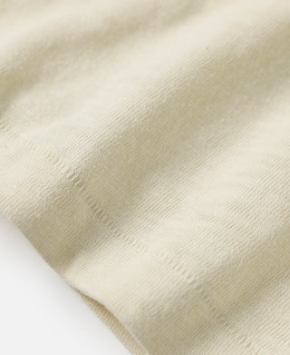 Cream white slub cotton T-shirt fabric texture, subtle woven slub